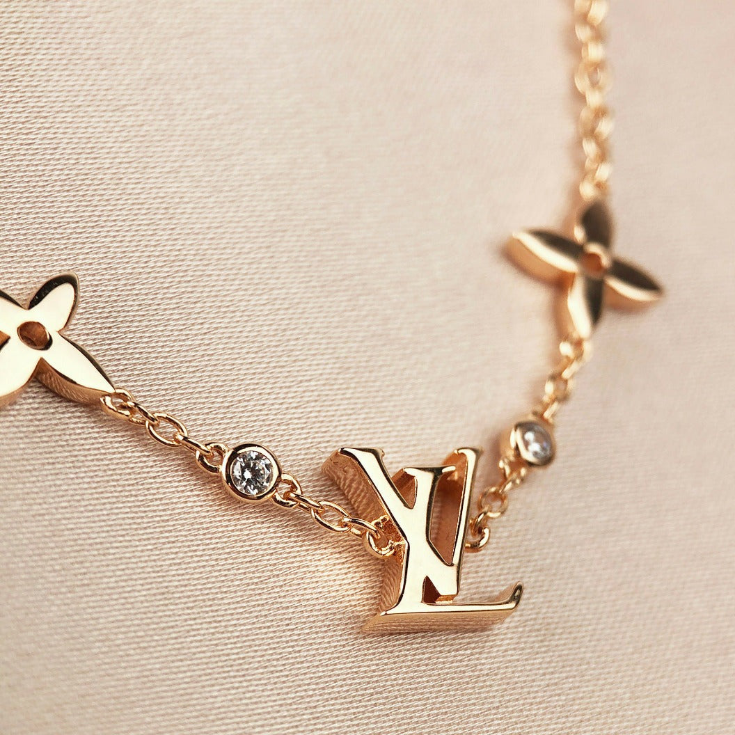 [BLUE TEARS]STAR AND SUN 7 MOTIFS GOLD BRACELET