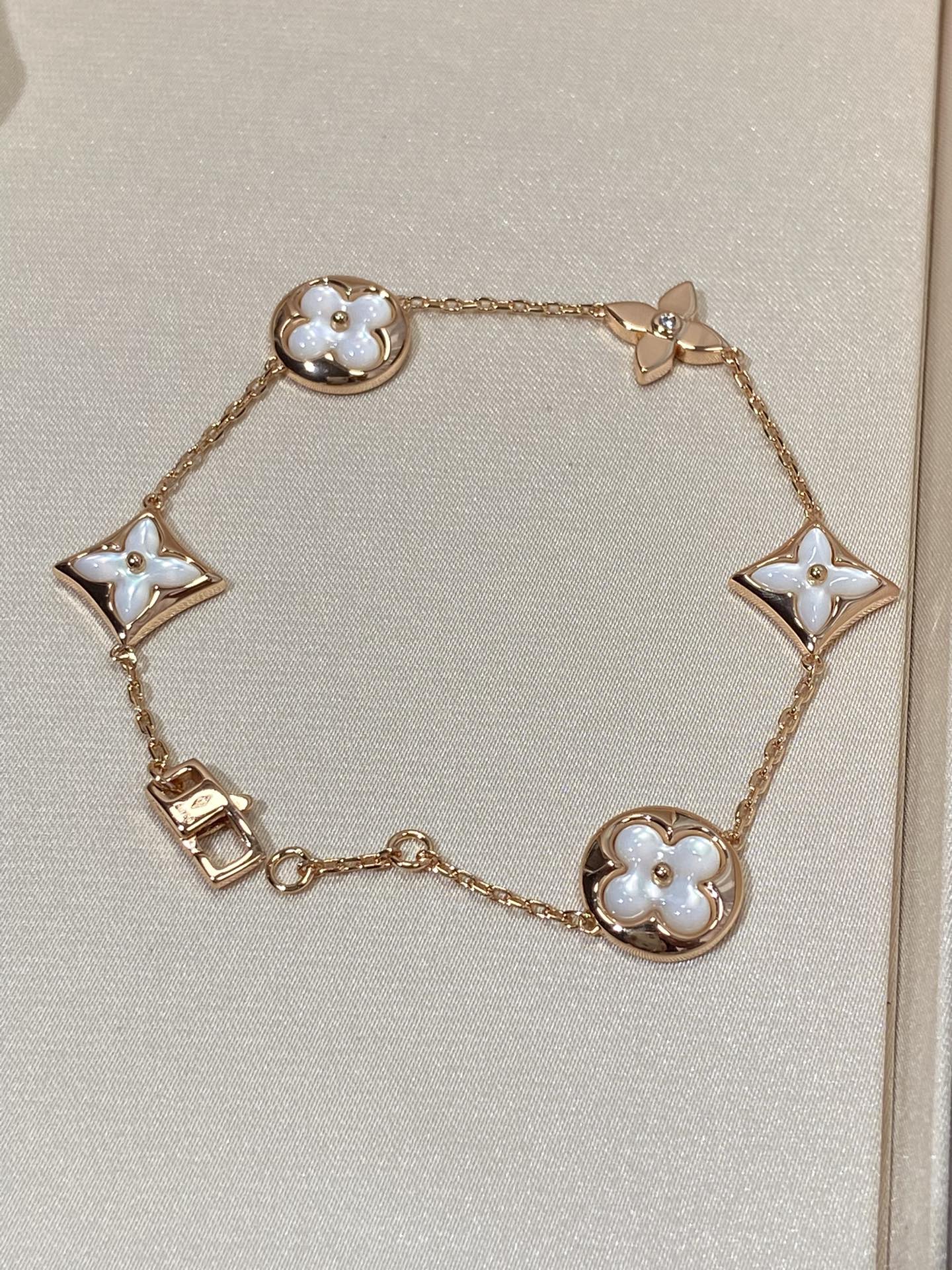 [BLUE TEARS]STAR AND SUN 5 MOTIF MOP PINK GOLD BRACELET