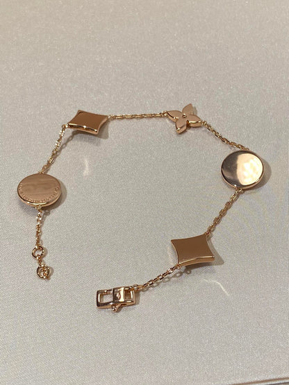 [BLUE TEARS]STAR AND SUN 5 MOTIF MOP PINK GOLD BRACELET