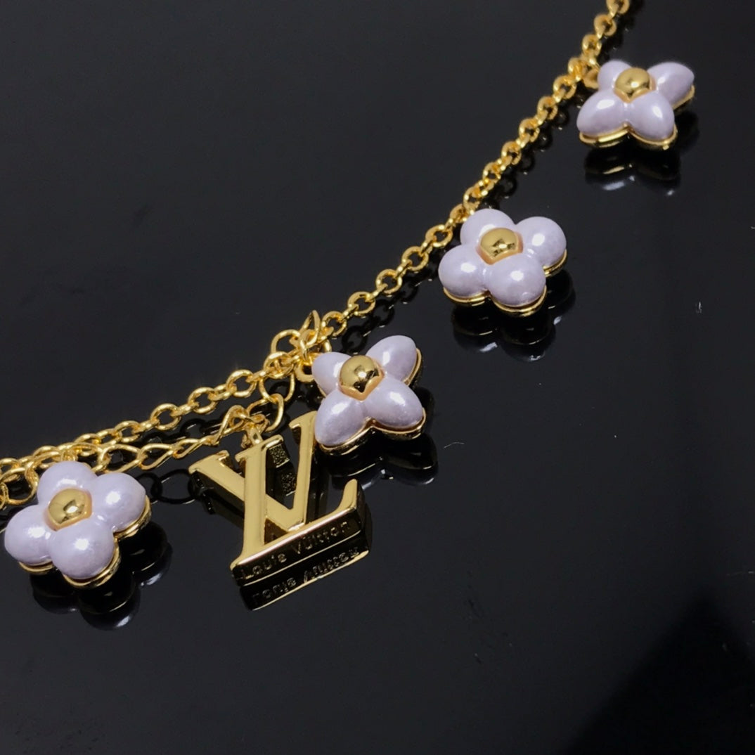 [BLUE TEARS]LOGO 6 MOTIF STAR AND SUN GOLD BRACELET