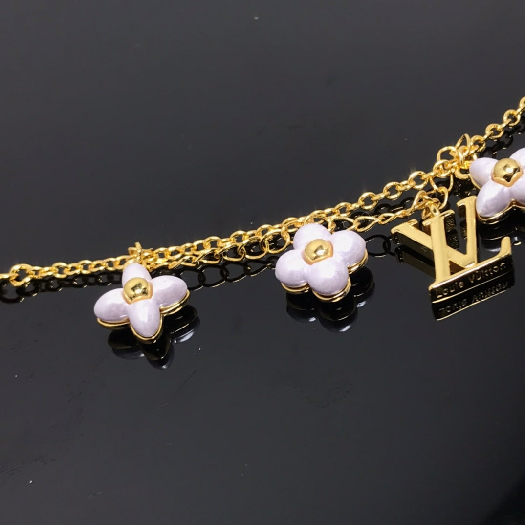 [BLUE TEARS]LOGO 6 MOTIF STAR AND SUN GOLD BRACELET