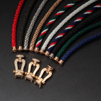 [BLAUE TRÄNEN]FORCE GROSSES HUFEISENARMBAND MIT DIAMANTEN IN GOLD