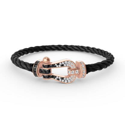 [BLAUE TRÄNEN]FORCE GROSSES HUFEISENARMBAND MIT SCHWARZEN WEISSEN DIAMANTEN UND ROSÉGOLD