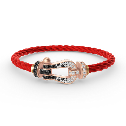[BLAUE TRÄNEN]FORCE GROSSES HUFEISENARMBAND MIT SCHWARZEN WEISSEN DIAMANTEN UND ROSÉGOLD
