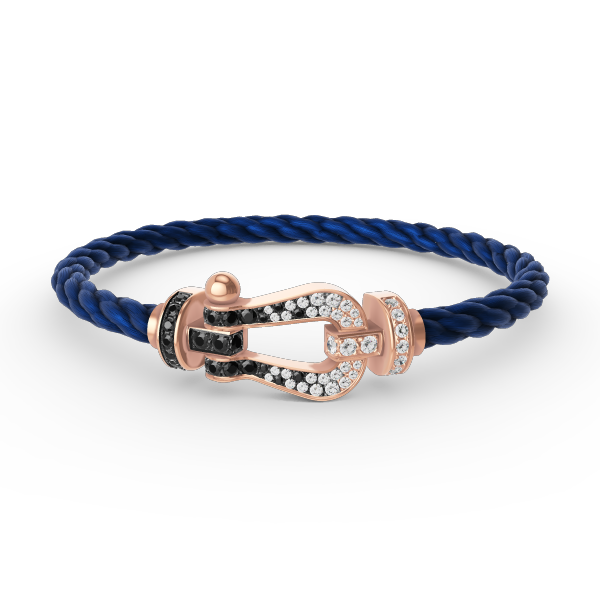 [BLAUE TRÄNEN]FORCE GROSSES HUFEISENARMBAND MIT SCHWARZEN WEISSEN DIAMANTEN UND ROSÉGOLD