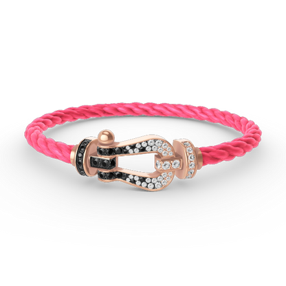 [BLAUE TRÄNEN]FORCE GROSSES HUFEISENARMBAND MIT SCHWARZEN WEISSEN DIAMANTEN UND ROSÉGOLD