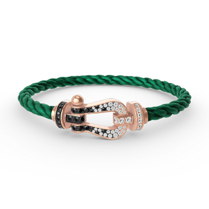 [BLAUE TRÄNEN]FORCE GROSSES HUFEISENARMBAND MIT SCHWARZEN WEISSEN DIAMANTEN UND ROSÉGOLD
